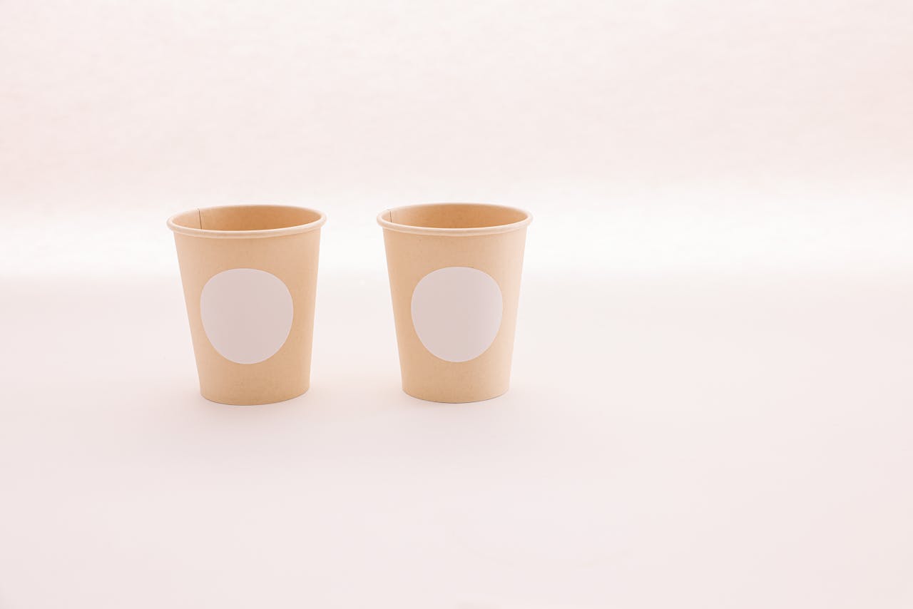 about-01 Simple and clean image showcasing eco-friendly disposable paper cups with minimalist design for mockup.
